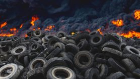 tires in lanfill pile on fire