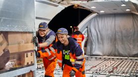 men loading plane