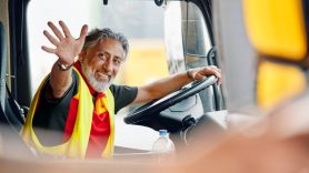 DHL truck driver waving