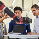 people being taught how to use equipment