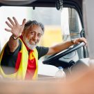 DHL truck driver waving