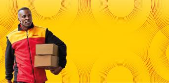 A DHL courier in a red jacket and yellow shirt carrying boxes.