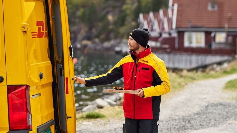 An employee working under DHL’s global logistics services