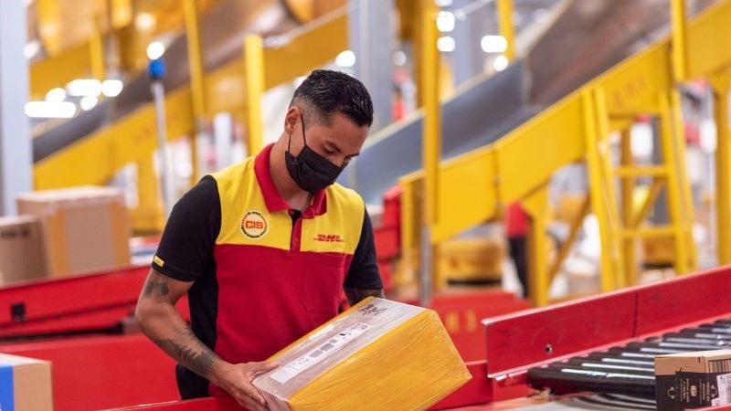 staff checking a package delivered during the full moon festival period