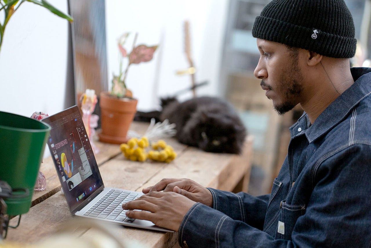 David Forteau working on a laptop