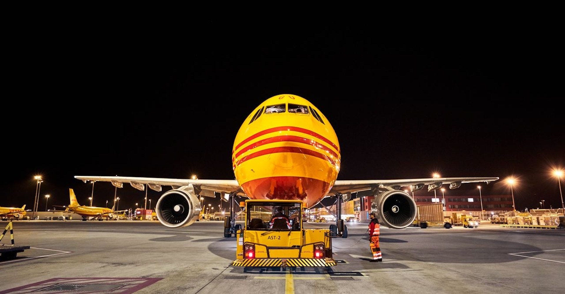 dhl staff preparing for international air express shipment of bangladesh exports