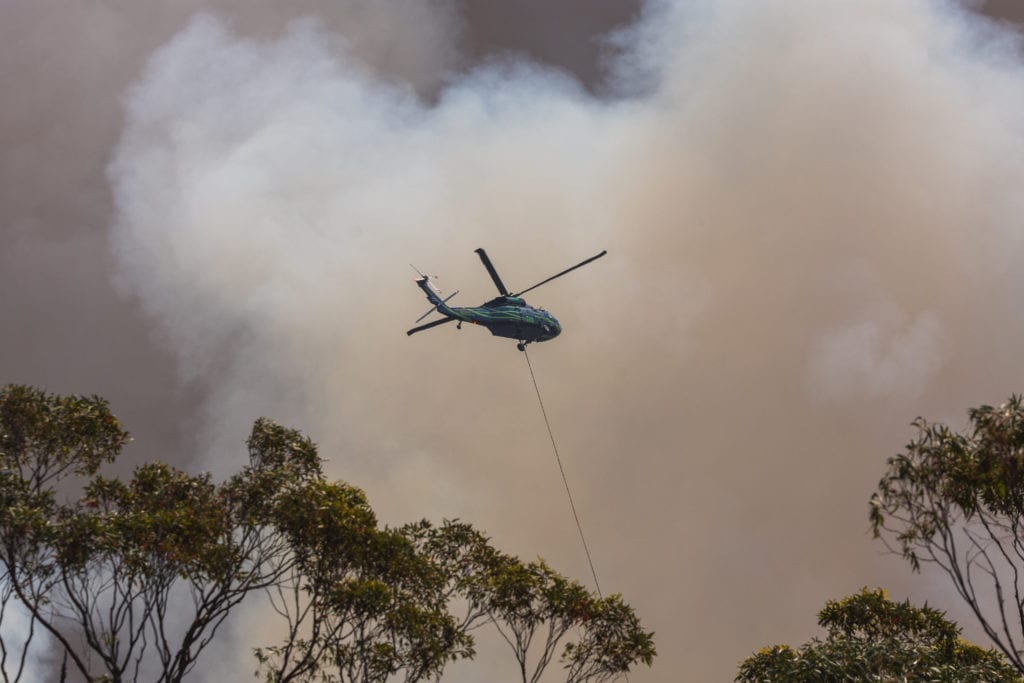 Water bombing helicopters have been deployed across the country to control the bushfires.