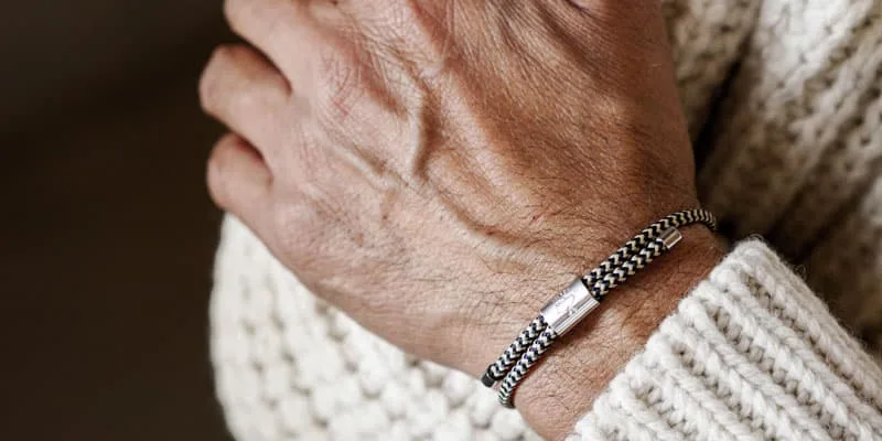 Man wearing Pig and Hen bracelet