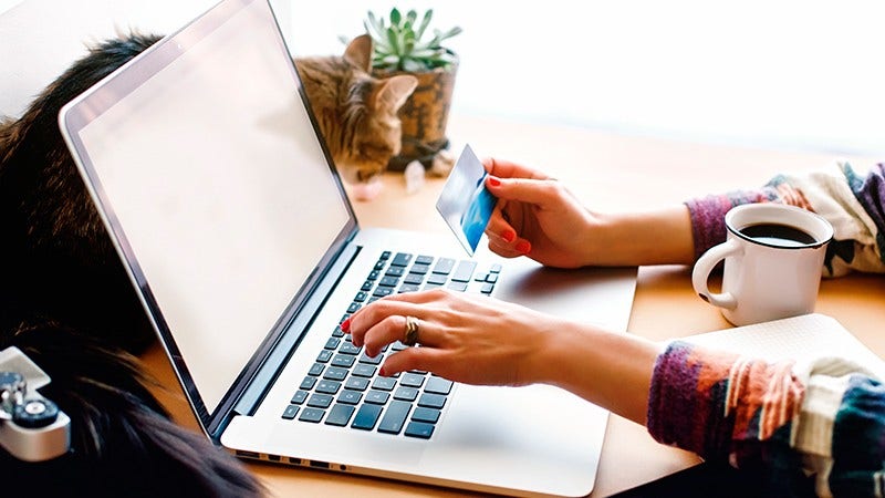 woman holding credit card