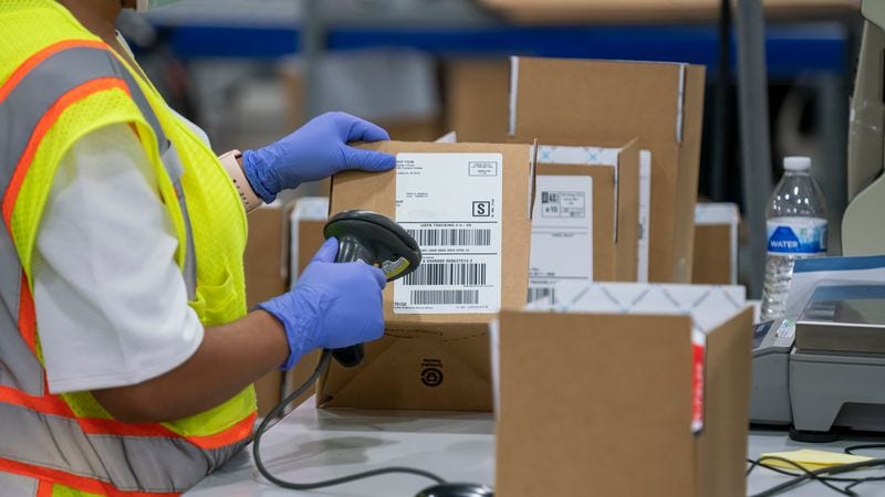 parcel being scanned and categorized