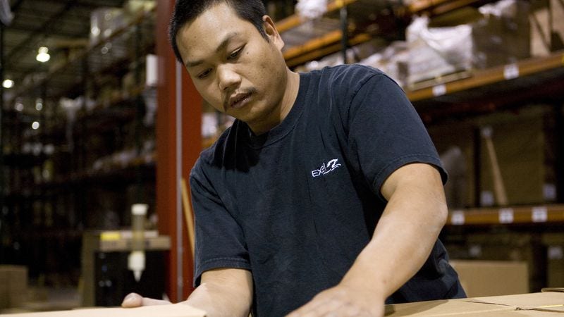 man checking goods in warehouse for international shipping from singapore