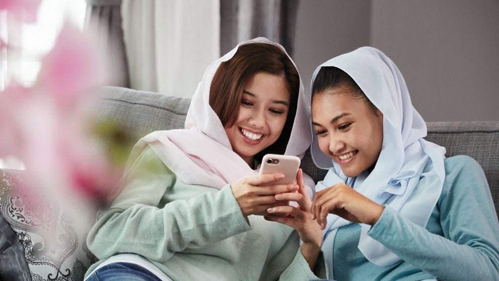 ladies searching online for the latest modern wear in Pakistan