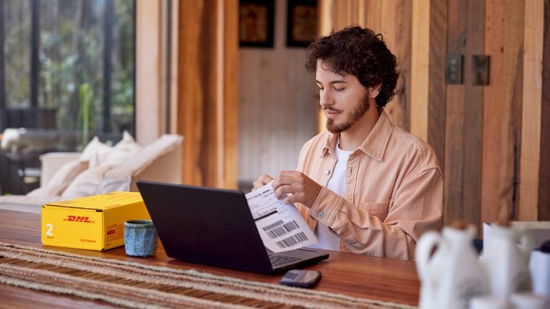 business owner preparing products for international shipping