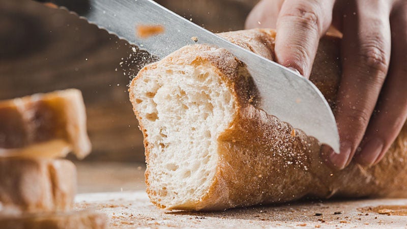 bread being sliced