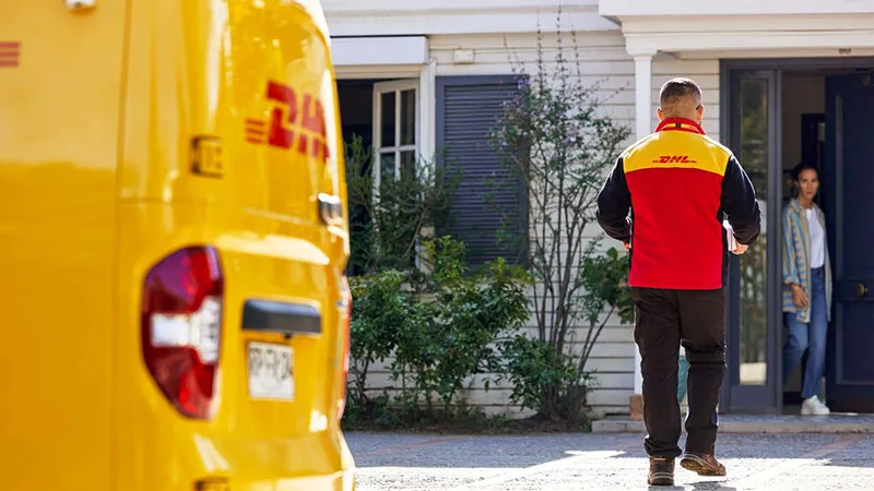 dhl express courier conducting last-mile delivery services