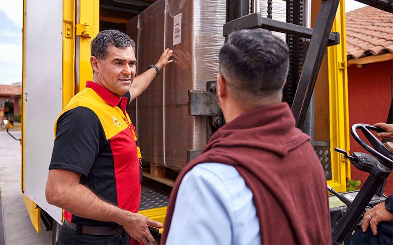 business owner using dhl express to ship bbq equipment