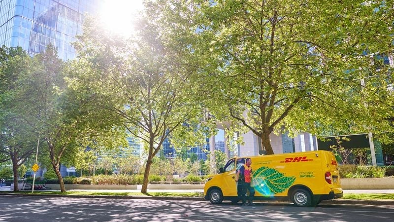 DHL Express delivery van shipping parcels in the city