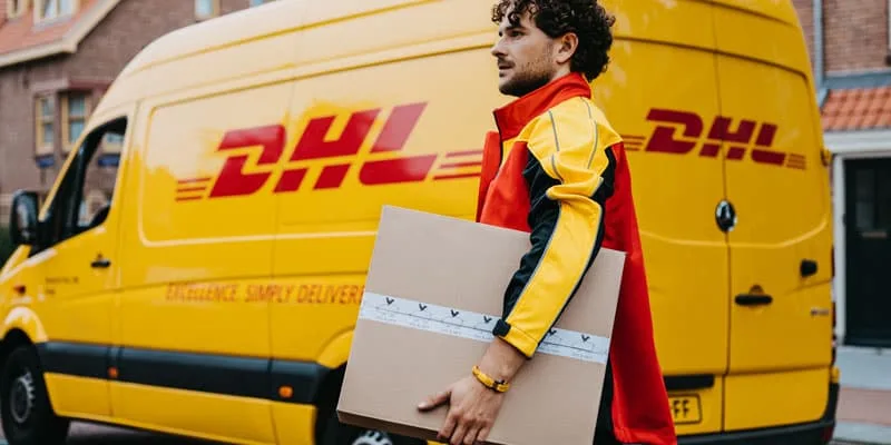 DHL Employee wearing Pig and Hen bracelet