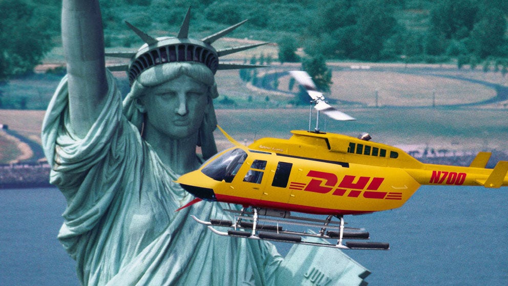 DHL Helicopter flying past the Statue of Liberty