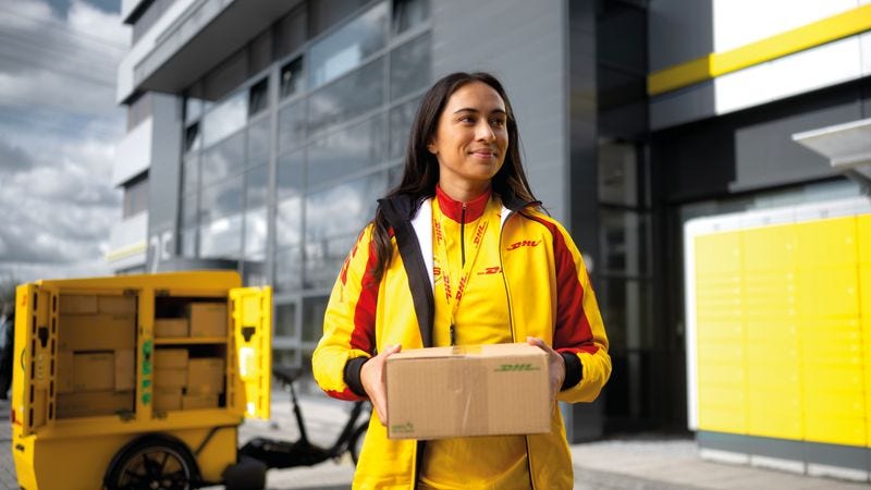 DHL employee delivering parcel to customers