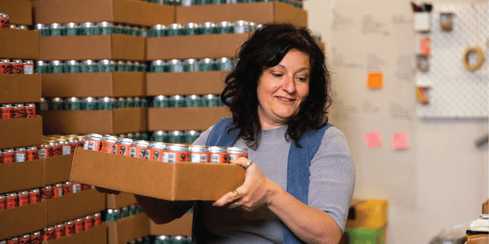 Wild Folk owner packing cans