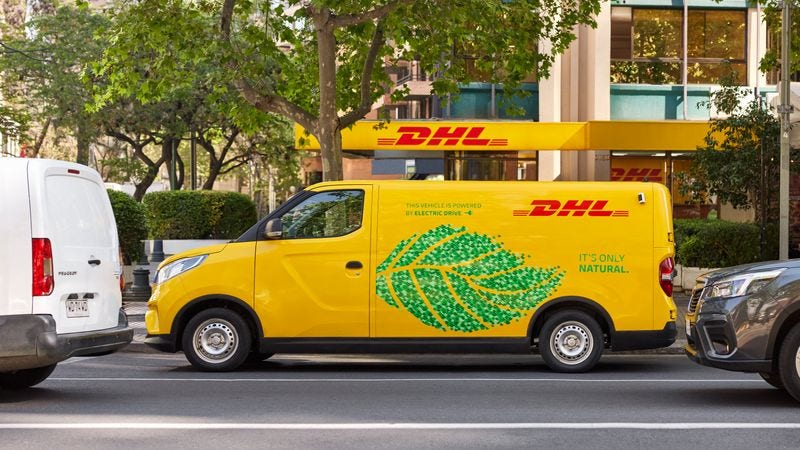 dhl gogreen delivery service van on the road