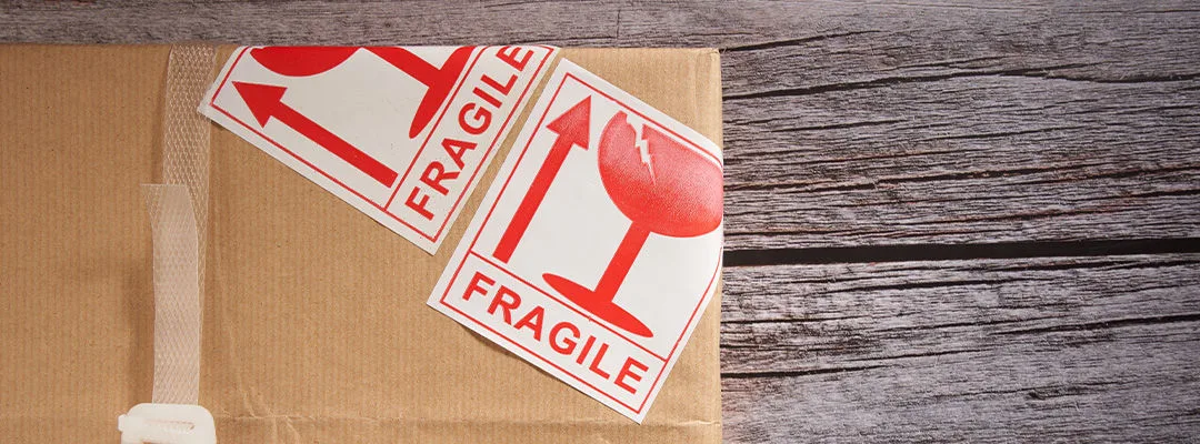 brown box with two fragile stickers