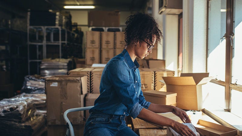 woman packing parcels