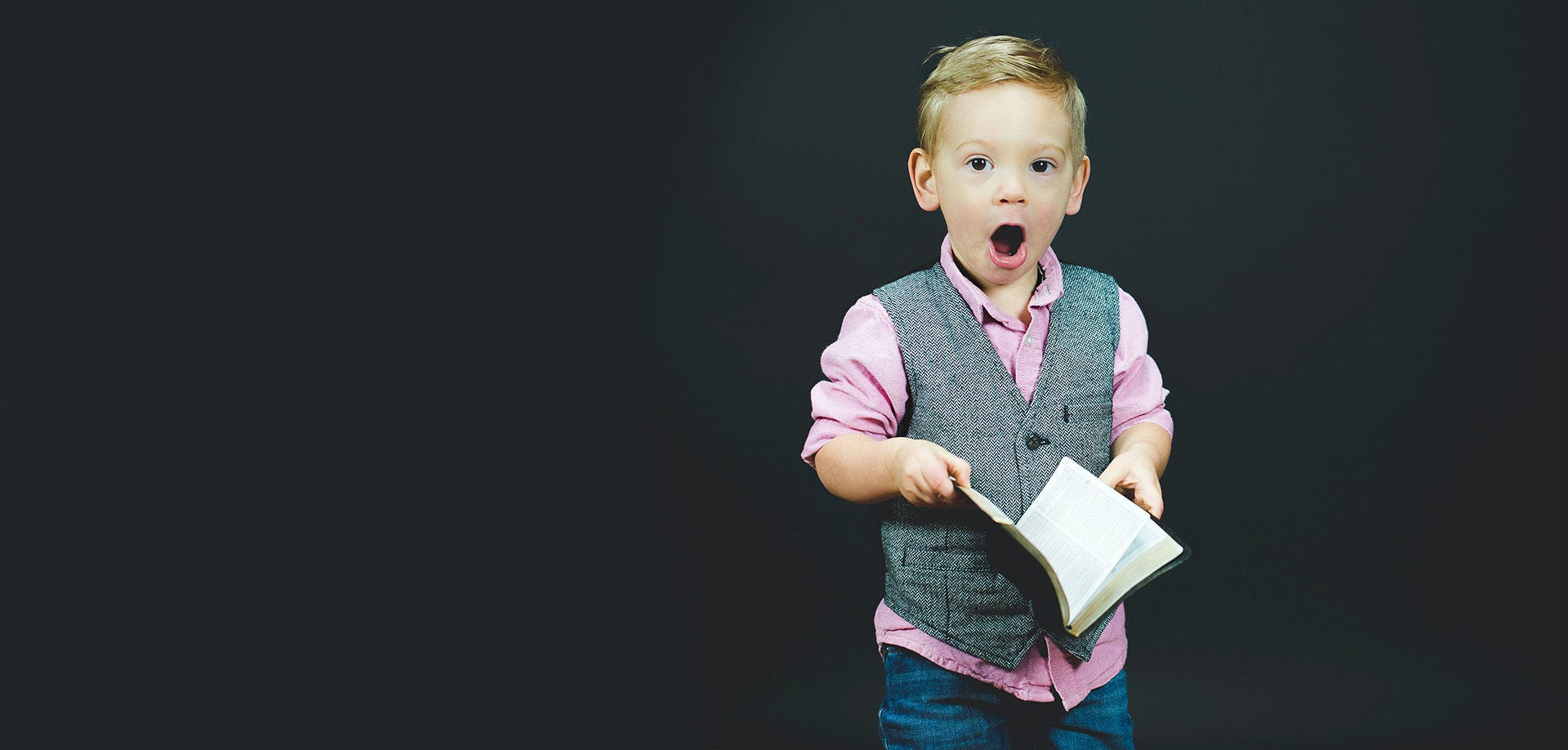 little boy with mouth open