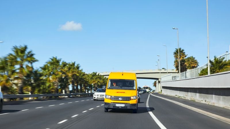 dhl express delivery van delivering items