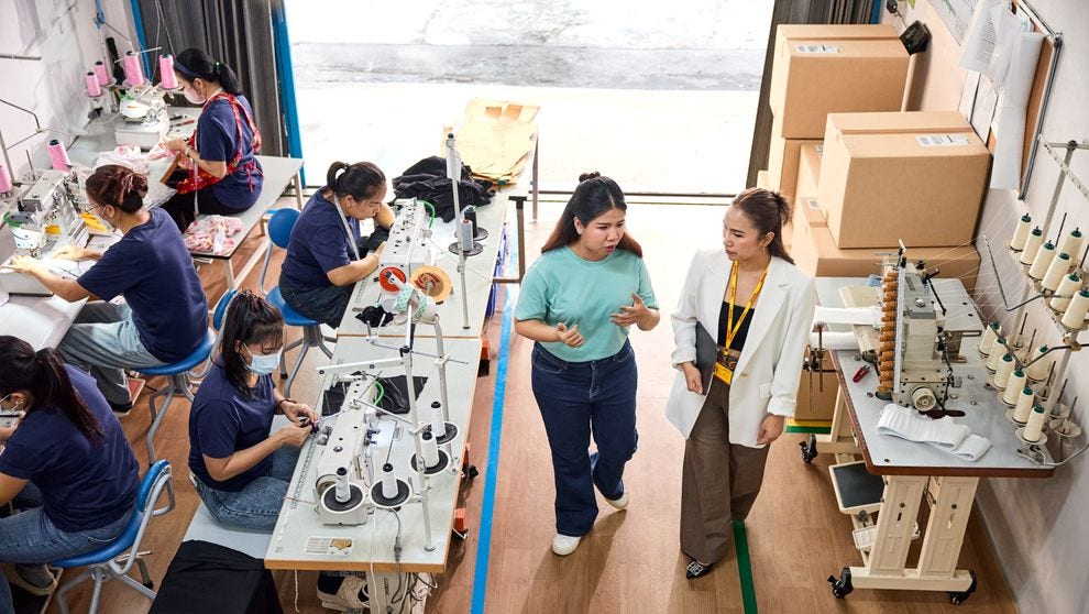 a business owner discussing entrepreneurship opportunities in Bangladesh with an international partner