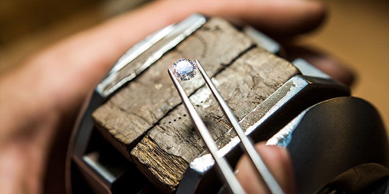 tweezers holding a diamond