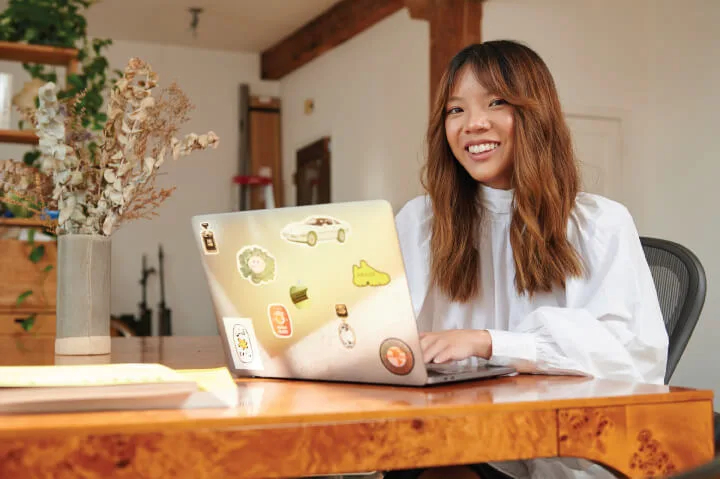 Dani working at her desk