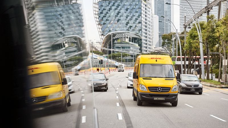 dhl van in the city