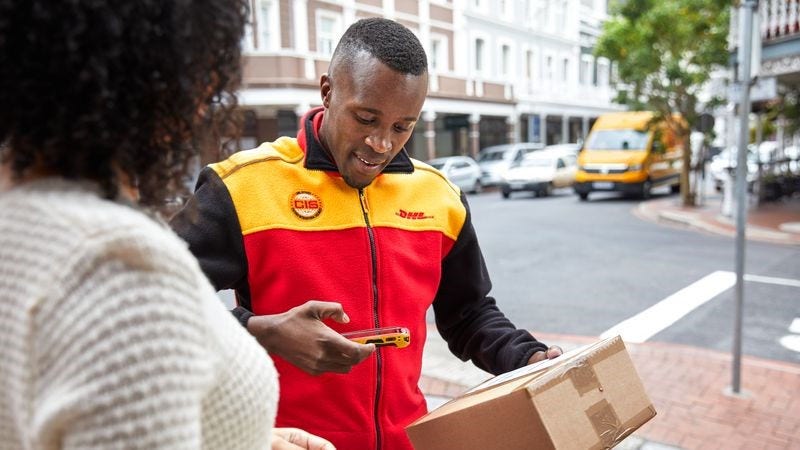 DHL personnel engaging in international delivery services