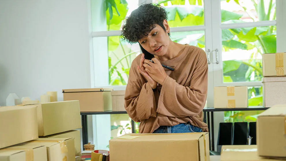 woman packing boxes