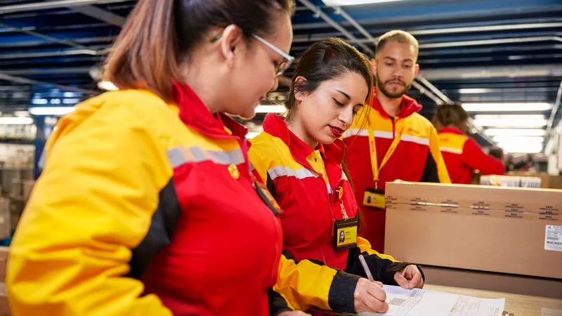 staff checking records to ensure proper e-commerce inventory management