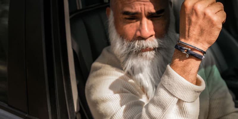 Man wearing Pig and Hen bracelet