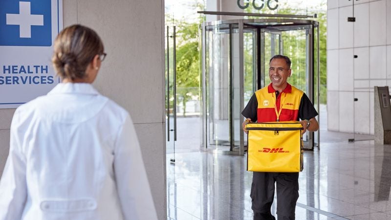 A DHL Express personnel engaging in their medical shipping services