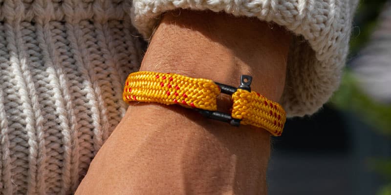 Man wearing Pig and Hen bracelet