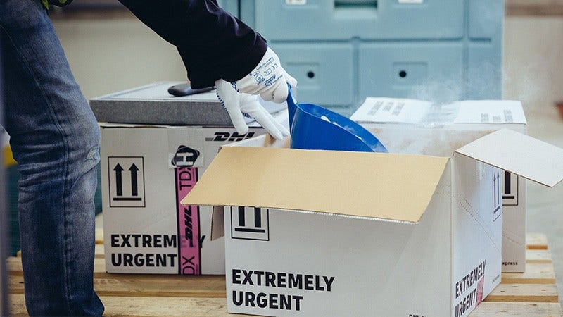 person packing package with ice