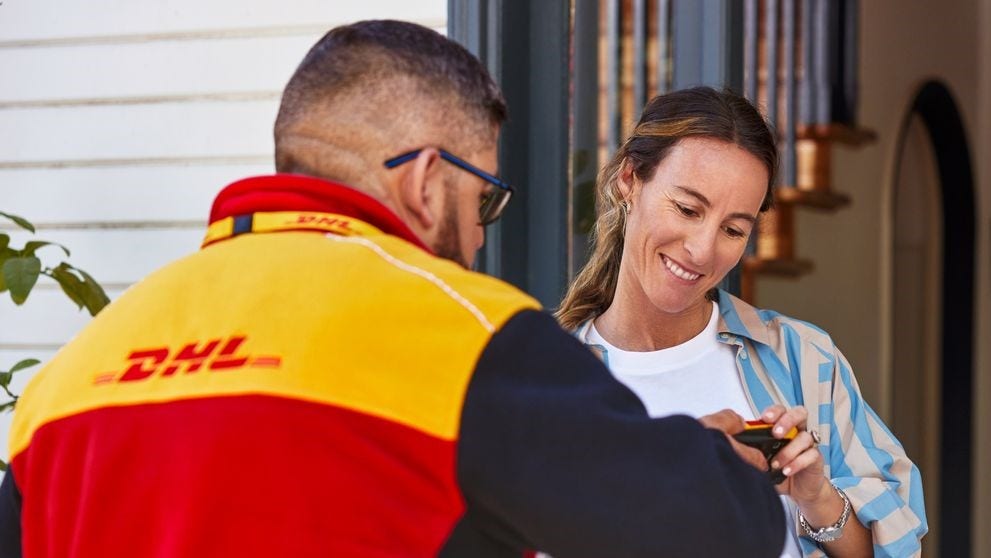 DHL parcel delivery with customer signing on the scanner