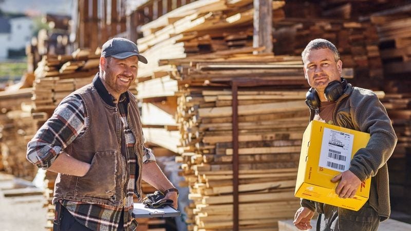 two New Zealanders dealing with wood exports