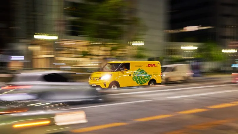 dhl express delivery van quickly shipping products during peak season