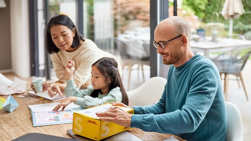 small business owner preparing parcel for express delivery