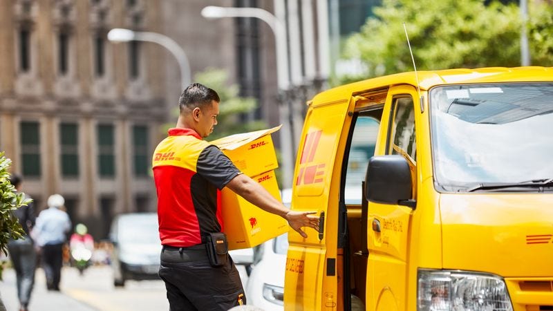 dhl express courier delivering packages to customers