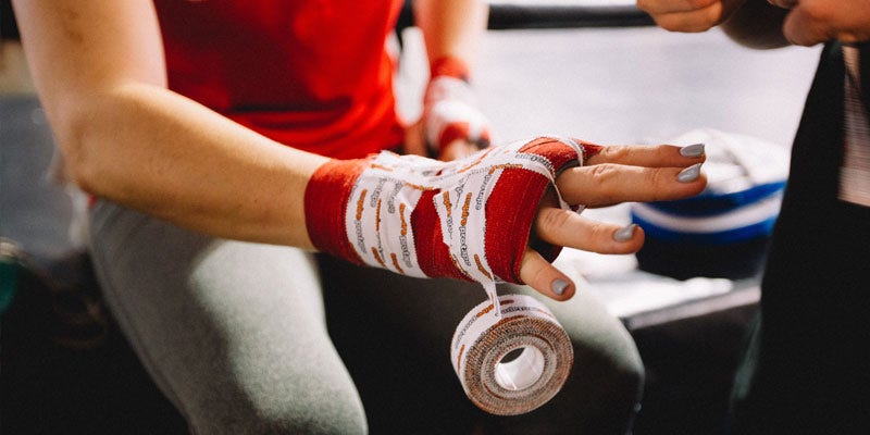 boxer's hand wrapped in tape