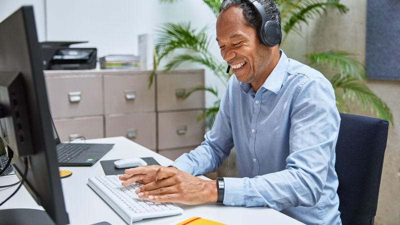 businessman in Thailand using computer to login DHL eSecure