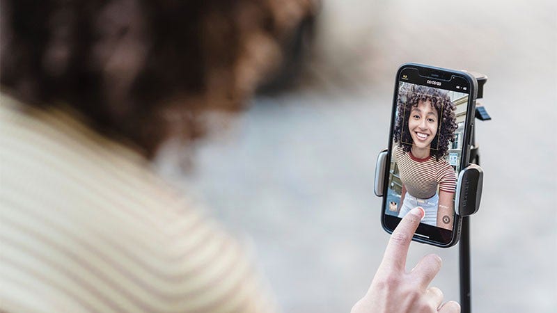 woman swiping on a mobile screen