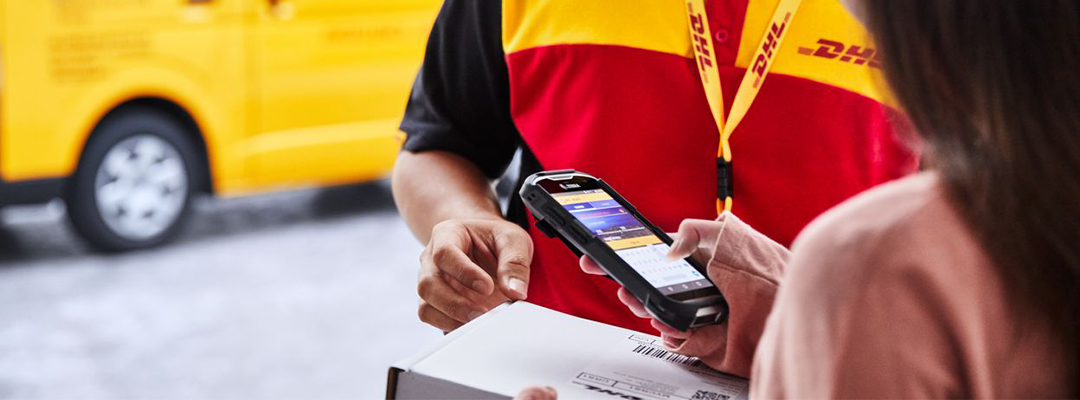 DHL courier handing over parcel